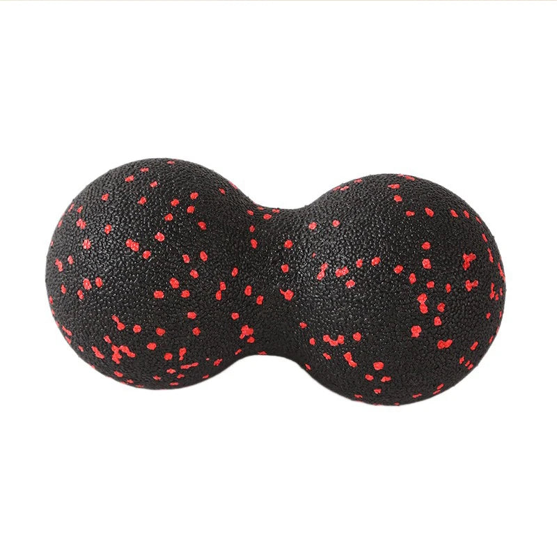 Black double massage ball with red speckles for muscle relief, The Relief Method product