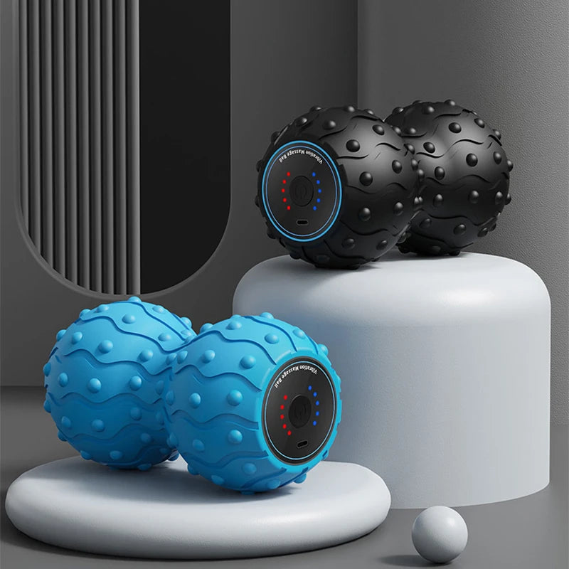 Blue and black spiky massage balls on display pedestals for The Relief Method homepage